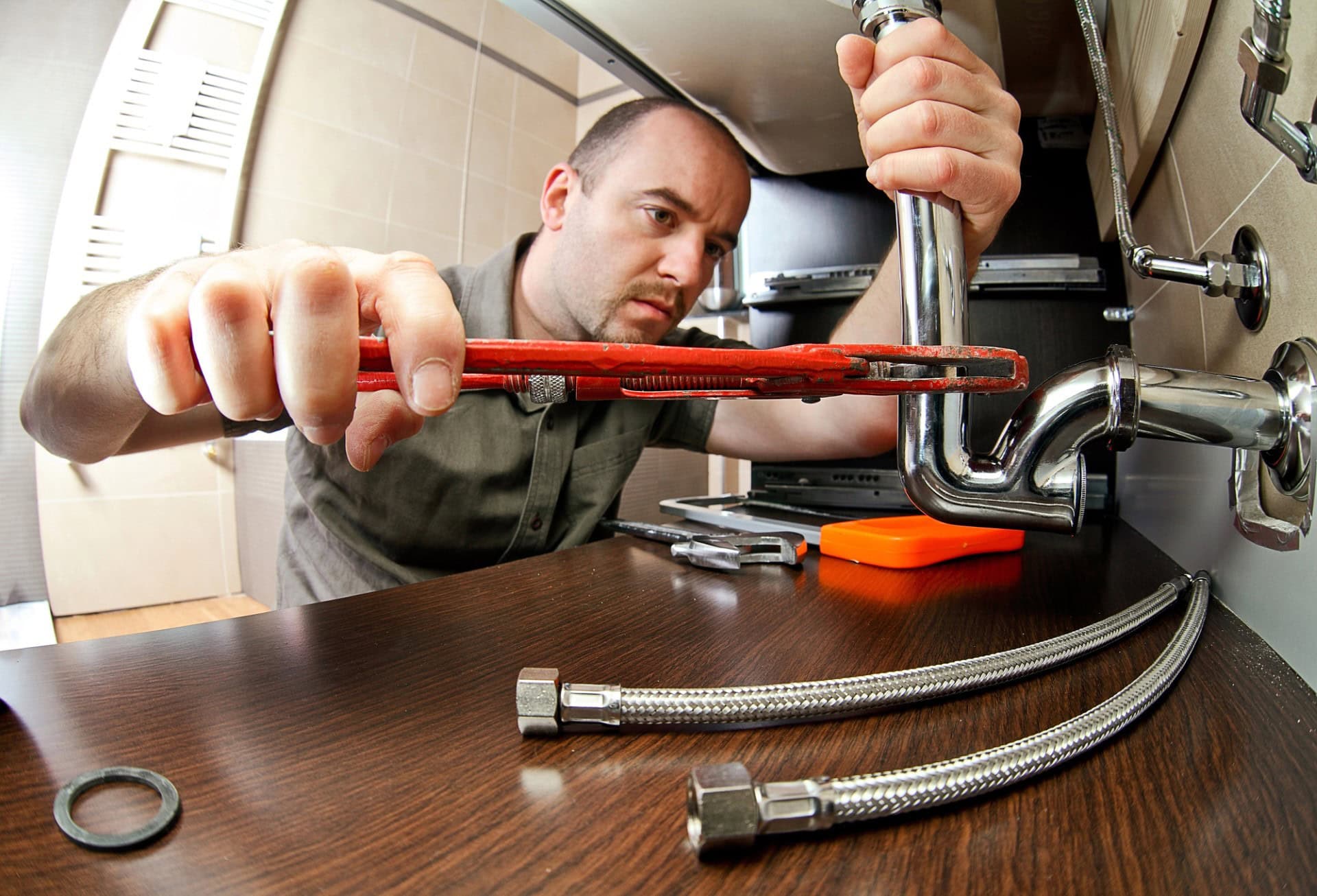 Plumber fitting bathroom sink services hero